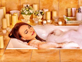 Woman releaxing in bath to support 3 detox baths to sooth your body,mind and soul blog at the om shoppe sarasota florida