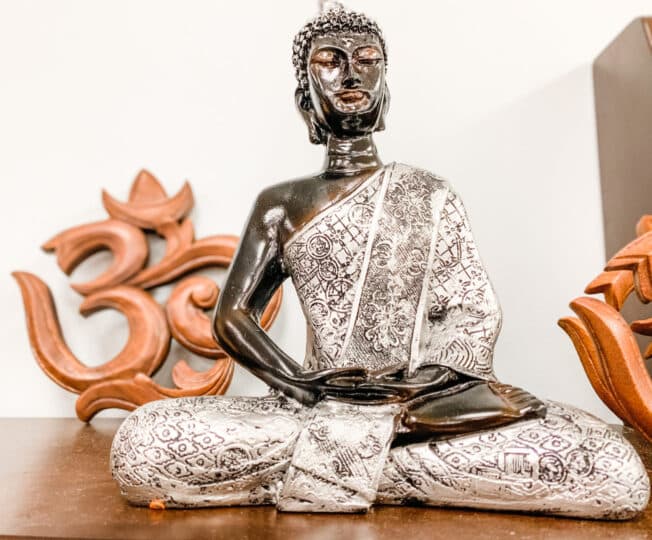 buddha statue as 5 vibrational practices for the waning moon