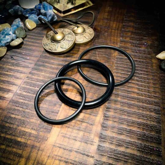 Group of 3 black o-rings at The OM Shoppe & Spa