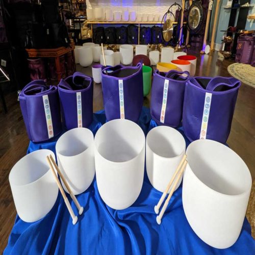 Crystal singing bowls with cases and bamboo strikers